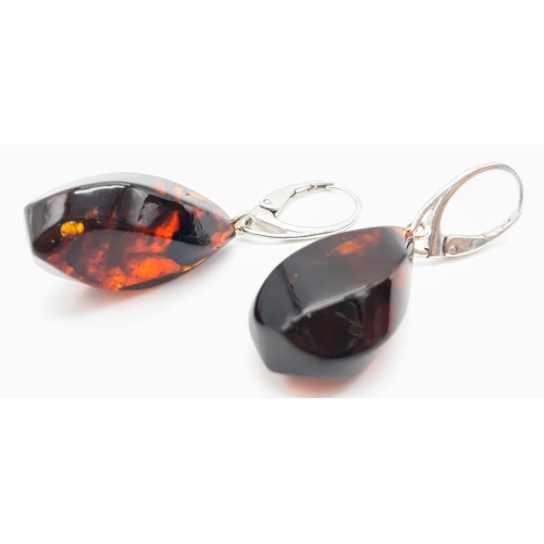 1572 - A Pair of Red Amber Drop Earrings. 3cm