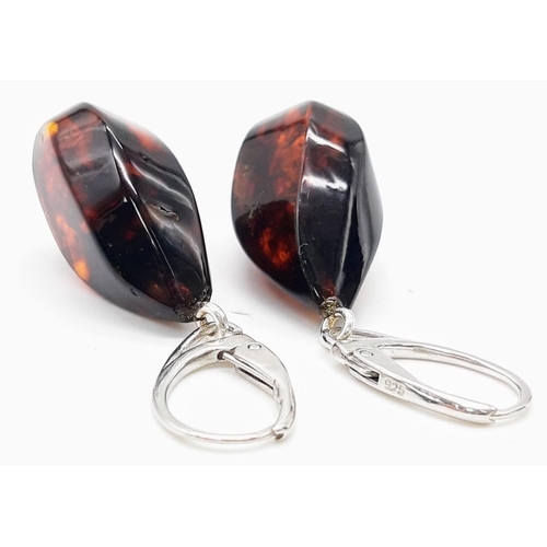 1572 - A Pair of Red Amber Drop Earrings. 3cm