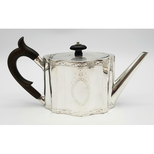 878 - A 1785 Hester Bateman George III Silver Teapot. Oval form with empty cartouche to side. Minimalist g... 