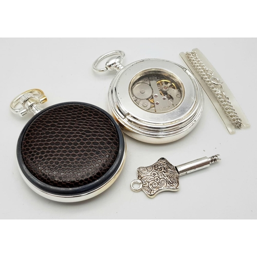 1295 - A Parcel of Two Manual Wind Pocket Watches Comprising; 1) A Key Wind Silver Tone ‘Standing’ Pocket W... 