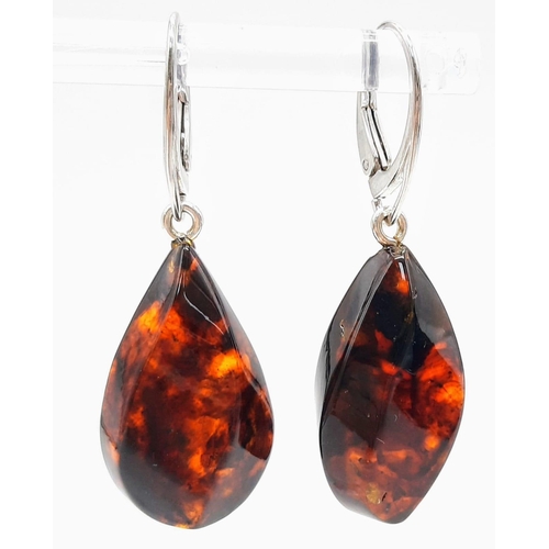 1572 - A Pair of Red Amber Drop Earrings. 3cm