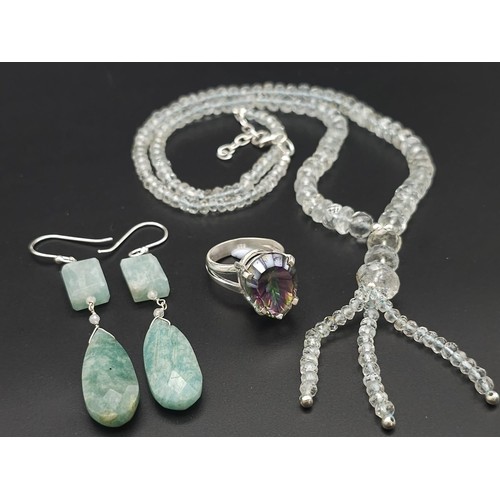 131 - A Single Strand Aquamarine Necklace With Dangler Earrings and A Mystic Topaz Ring all on 925 Silver.... 