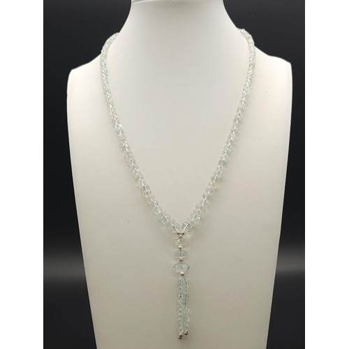 131 - A Single Strand Aquamarine Necklace With Dangler Earrings and A Mystic Topaz Ring all on 925 Silver.... 