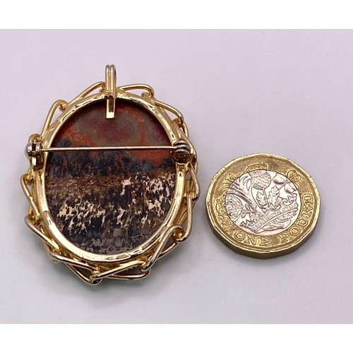 396 - Fancy Agate Stone Brooch.
Large stone framed by Gold Tone twisted metal border. Brooch measures 4cm ... 