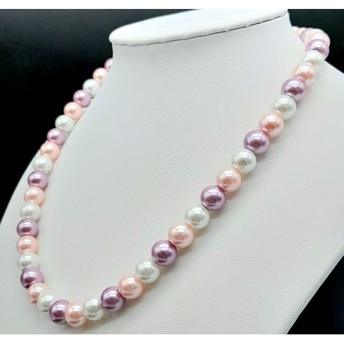 425 - Multi-coloured Pearlescent Necklace with Gold Filled Clasp.
Measuring 40cm in length.