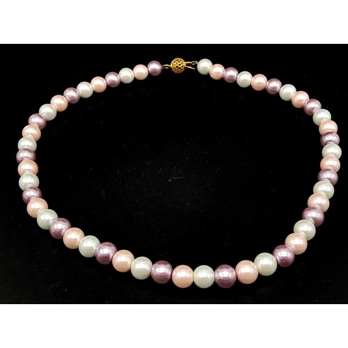 425 - Multi-coloured Pearlescent Necklace with Gold Filled Clasp.
Measuring 40cm in length.