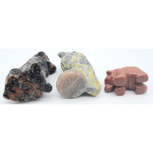 432 - A trio of Stone Carved Animals.
Featuring a Eagle, Dog and Bear. Various sizes, ranging within a fra... 