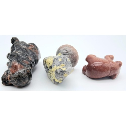 432 - A trio of Stone Carved Animals.
Featuring a Eagle, Dog and Bear. Various sizes, ranging within a fra... 