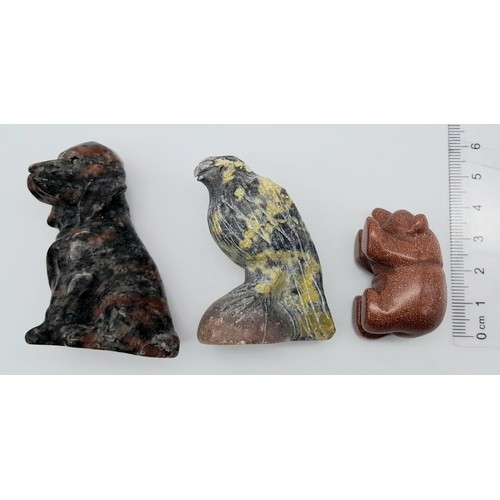 432 - A trio of Stone Carved Animals.
Featuring a Eagle, Dog and Bear. Various sizes, ranging within a fra... 