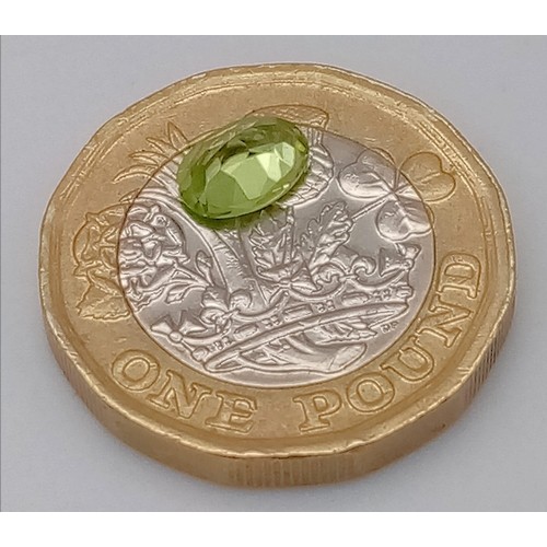 439 - AN OVAL PERIDOT 0.82CT