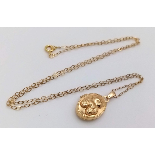 16 - A 9K Yellow Gold Frog Locket on a 9K Yellow Gold Disappearing Necklace. 2cm and 40cm. 1.2g weight.