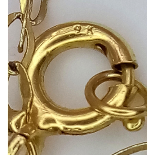 16 - A 9K Yellow Gold Frog Locket on a 9K Yellow Gold Disappearing Necklace. 2cm and 40cm. 1.2g weight.