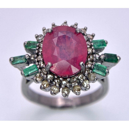 345 - A 5.80ct Ruby Ring with  0.40ctw Emeralds and 0.70ctw of Diamond Accents. Set in 925 Silver. Size M.... 