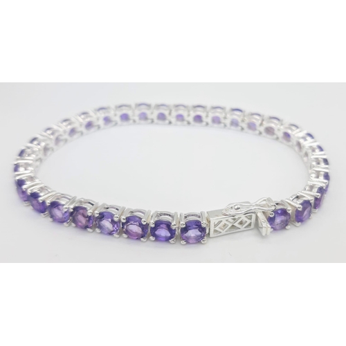 407 - An Amethyst Gemstone Tennis Bracelet set in 925 Silver. 18cm length. 16.25g total weight. Ref: CD-12... 