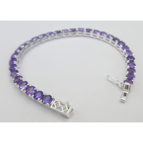 407 - An Amethyst Gemstone Tennis Bracelet set in 925 Silver. 18cm length. 16.25g total weight. Ref: CD-12... 