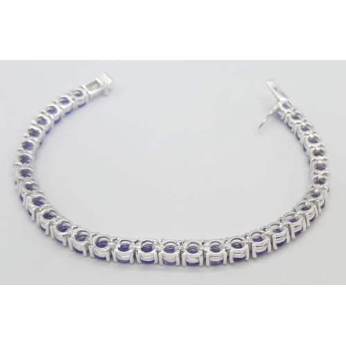 407 - An Amethyst Gemstone Tennis Bracelet set in 925 Silver. 18cm length. 16.25g total weight. Ref: CD-12... 