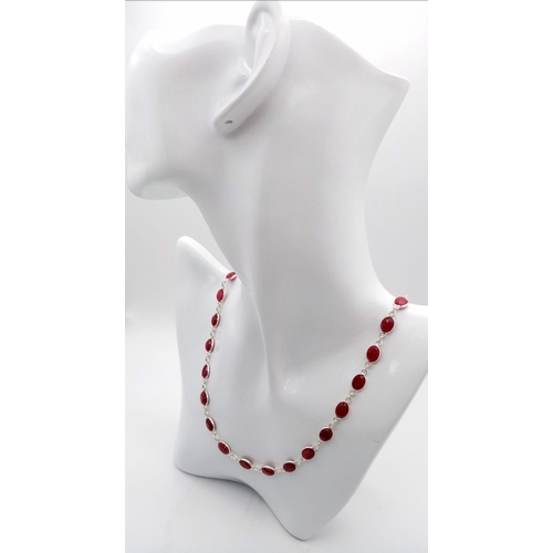 435 - A Ruby Gemstone Long Chain Necklace set in 925 Silver. 56cm length. 22.5g total weight. Ref: CD-1233