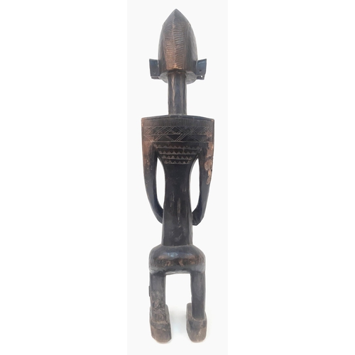 460 - An Antique African Songye Tribe Female Wooden Statue. This fertility and youth statue stands at 95cm... 