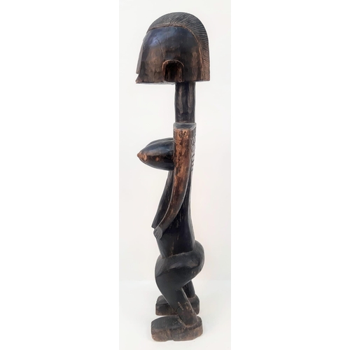 460 - An Antique African Songye Tribe Female Wooden Statue. This fertility and youth statue stands at 95cm... 