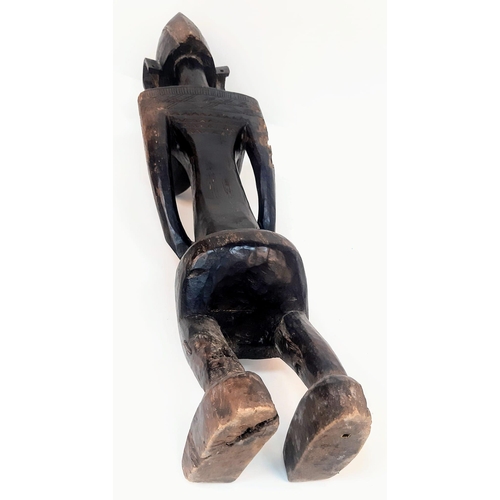 460 - An Antique African Songye Tribe Female Wooden Statue. This fertility and youth statue stands at 95cm... 