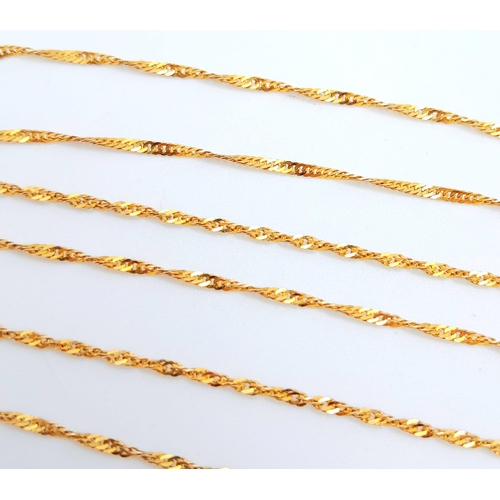 464 - An Italian 9K Yellow Gold Twisted Flat Curb Necklace. 60cm length. 2.31g weight.