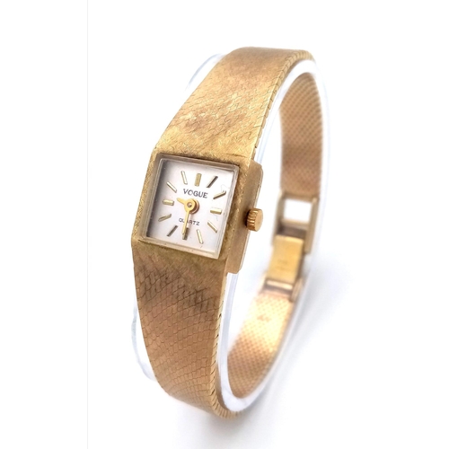 466 - A Vogue Quartz 9K Gold Ladies Watch. 9k gold bracelet and case - 15mm width. 25.74g weight. Approx g... 