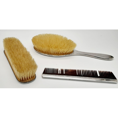 276 - An Antique Sterling Silver Hair, Clothes Brush and Comb Set. Hallmarks for Birmingham 1919. Makers m... 