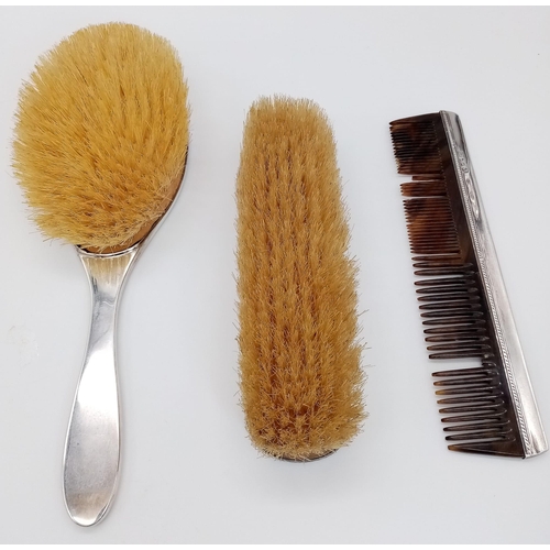 276 - An Antique Sterling Silver Hair, Clothes Brush and Comb Set. Hallmarks for Birmingham 1919. Makers m... 