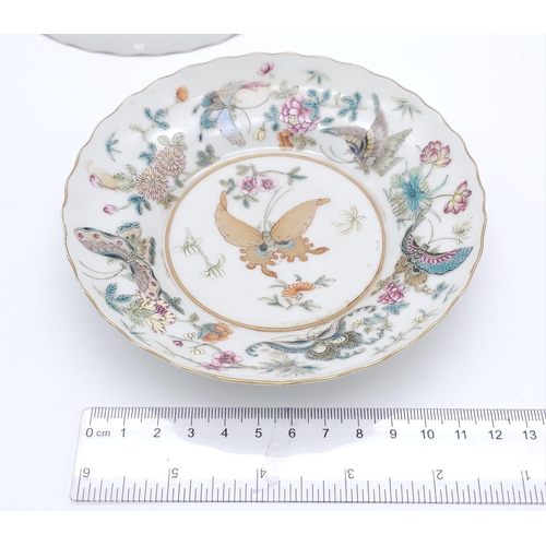 99 - A set of 4 Daoguang (1820-1850) Era Dishes.
Beautifully decorated with a iridescent floral & butterf... 