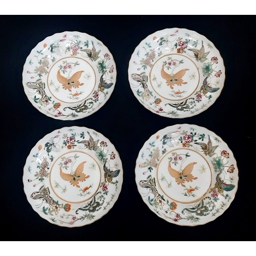 99 - A set of 4 Daoguang (1820-1850) Era Dishes.
Beautifully decorated with a iridescent floral & butterf... 