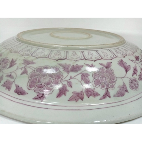 100 - Large Antique Burgundy Floral Serving Dish.
Whilst no markings exist on this large bowl, the hand-pa... 