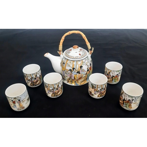 206 - A Chinese Tea Set with 6 cups.
Comprising of a Teapot with bamboo handle and six Chinese Tea Cups. E... 