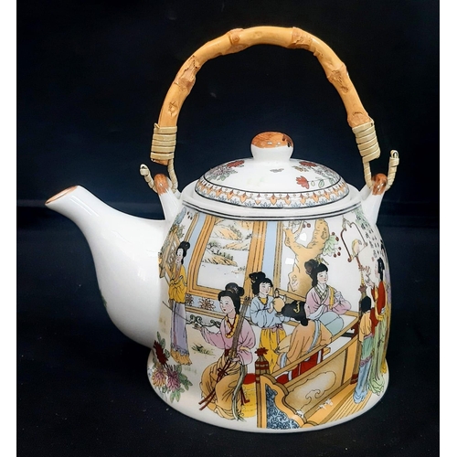 206 - A Chinese Tea Set with 6 cups.
Comprising of a Teapot with bamboo handle and six Chinese Tea Cups. E... 