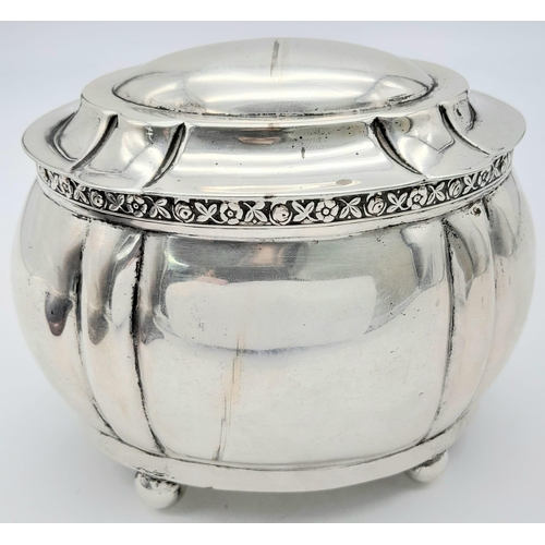 458 - An Antique Austro-Hungarian Empire Silver Lidded Bowl. Decorative rim, four pedestal-ball feet. Gild... 