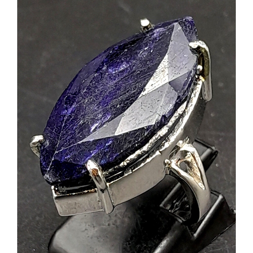 265 - A Marquise Cut Blue Sapphire 925 Silver Ring. Size M. Sapphire - 60ct.  12.70g total weight. Comes w... 