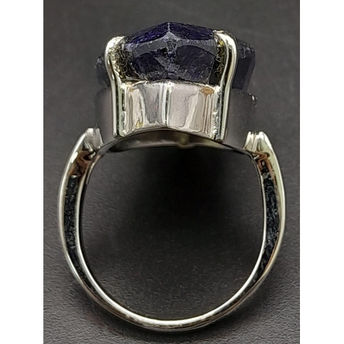 265 - A Marquise Cut Blue Sapphire 925 Silver Ring. Size M. Sapphire - 60ct.  12.70g total weight. Comes w... 