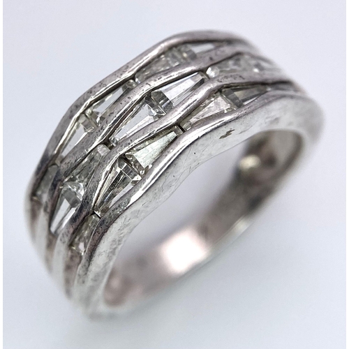 285 - A Parcel of Sterling Silver Jewellery. 
Featuring a Cubic Zirconia panelled Ring (Size M) and long 4... 