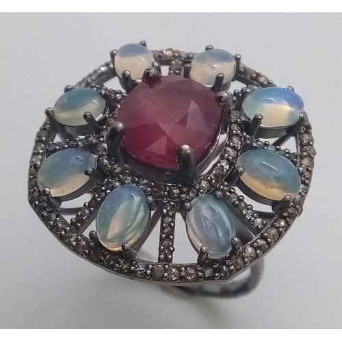 290 - A Decorative Floral 5.25ct Ruby Ring with 2.15ctw of Opal and 1.10ct Diamond Surround. Set in 925 Si... 