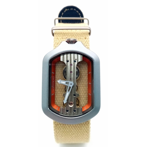 51 - A Verticale Mechanical Top Winder Unisex Watch. Beige textile strap with silver tone skeleton case. ... 