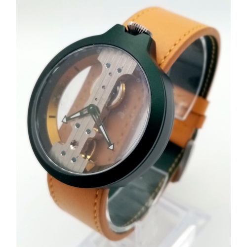 78 - A Verticale Mechanical Top Winder Unisex Watch. Orange strap, dark green tone skeleton case. As new ... 