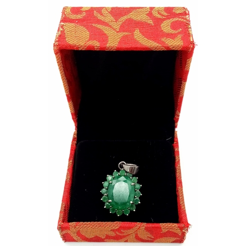 102 - A Zambian Emerald 925 Silver Pendant. Weight - 8.30 gm, Emerald - 14.50ct. 3.5cm. Ref: HV-2201. Come... 