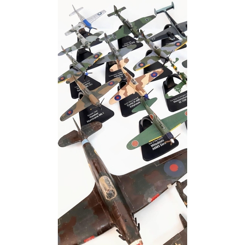 104 - A Collection of Battle of Britain Model Fighter Planes. Over thirty die-cast metal planes with stand... 