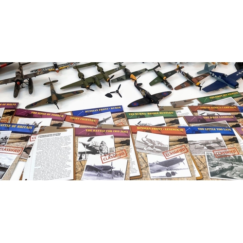 104 - A Collection of Battle of Britain Model Fighter Planes. Over thirty die-cast metal planes with stand... 