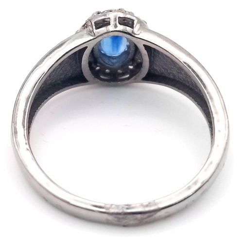 47 - A Kyanite and Diamond Ring set in 925 Silver with a Black Rhodium Coating. Size O. Kyanite- 0.85ct. ... 