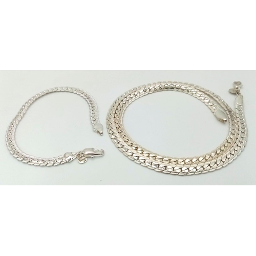 52 - A very good condition 925 silver matching set of snake chain necklace and bracelet, total weight 43g... 