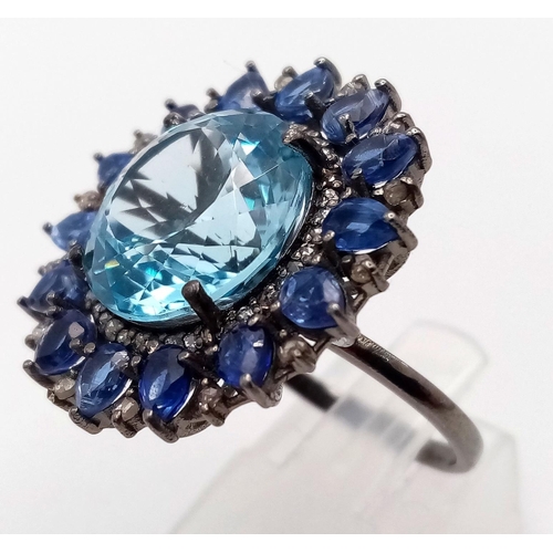 6 - A 12.5ct Blue Topaz, Kyanite & Diamond Ring set in 925 Silver with a Black Rhodium plating. Weight -... 