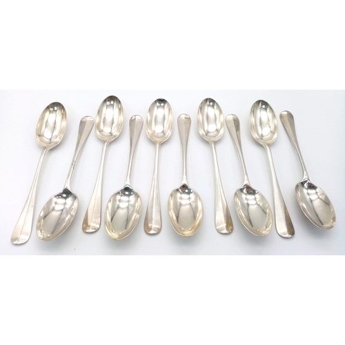 304 - Ten Mid-Size Sterling Silver Antique Spoons. 17cm. 546g total weight. Hallmarks for London 1924.