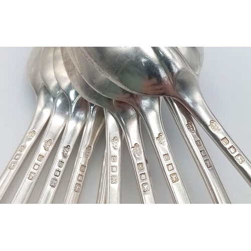 304 - Ten Mid-Size Sterling Silver Antique Spoons. 17cm. 546g total weight. Hallmarks for London 1924.