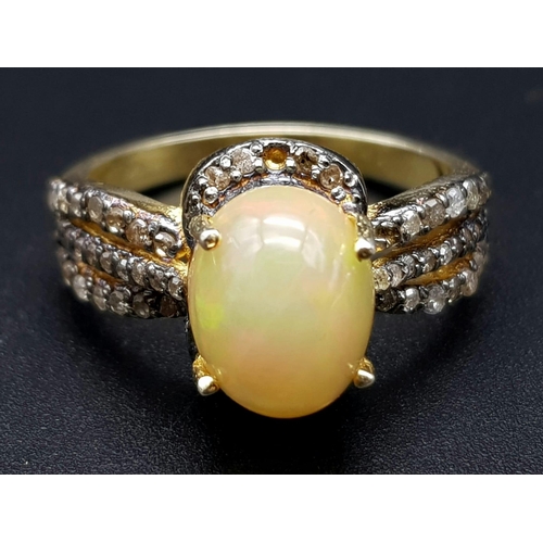 33 - An Ethiopian Opal and Diamond Ring set in Gold Plated 925 Silver. Weight - 4.40g. Opal - 1ct. Diamon... 