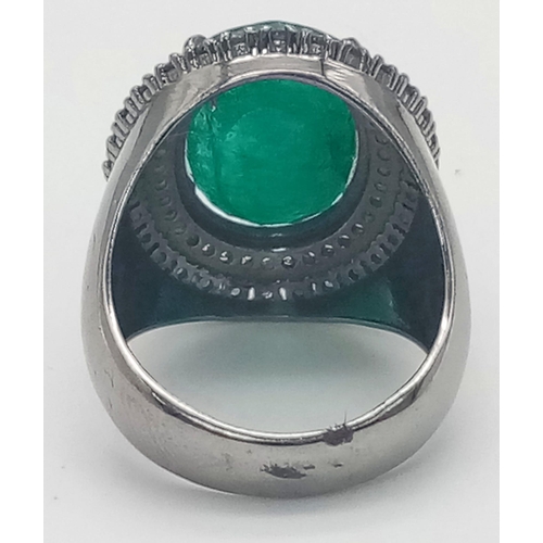 366 - An 8ct Emerald Ring with 0.80ctw of Blue Sapphire and 0.65ct Diamond Accents. Set in 925 Silver. Siz... 